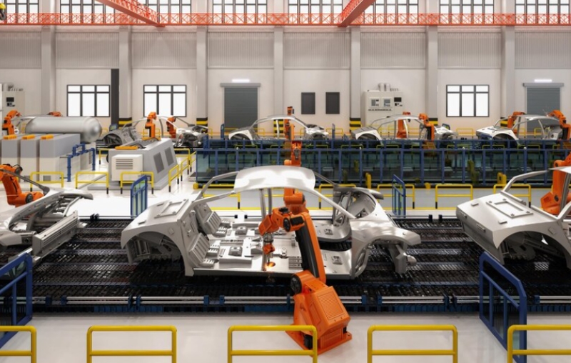 Robot đang lắp r&aacute;p xe trong nh&agrave; m&aacute;y